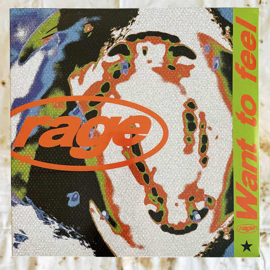 This is a vinyl LP record of Rage, Want To Feel. It has a bright colourful patterned cover