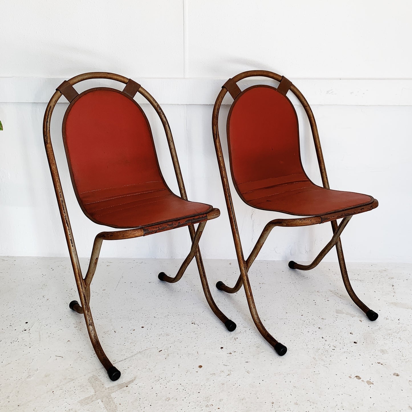 Pair of Red Delicious Sebel Stak-A-Bye Garden Chairs
