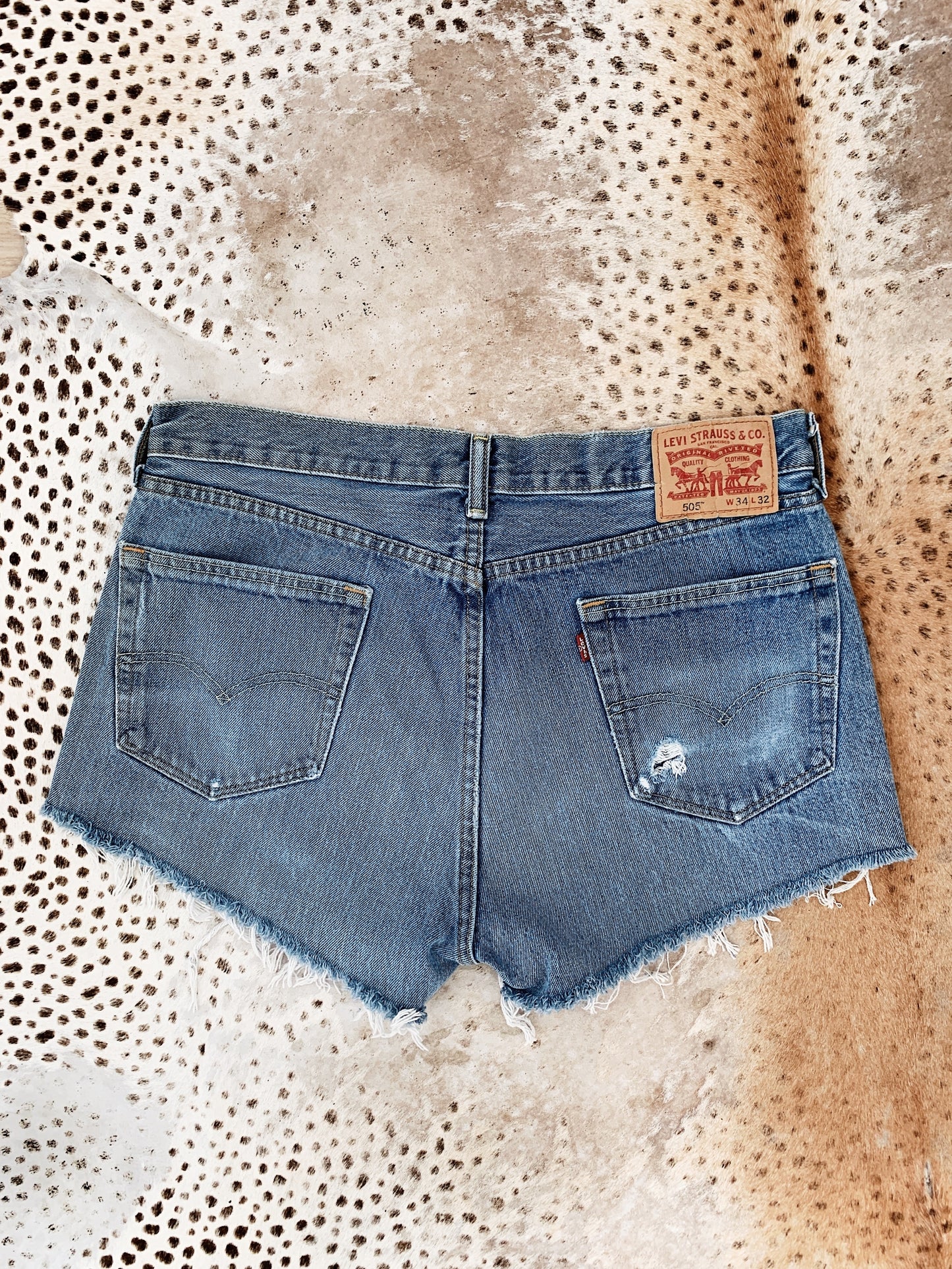 Vintage Levi's High W Re-cut Denim Shorts / Size 35